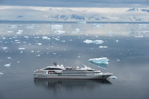 Expedition Ship Cruising Neko Harbour in Antarctica